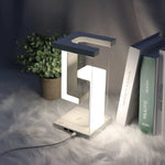 Load image into Gallery viewer, Elegante Tischlampe "anti-gravity" mit Ladestation
